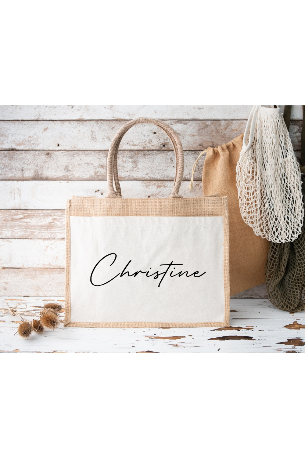 Personalized jute shopping bag with name "Christine" in elegant script, eco-friendly and stylish accessory.