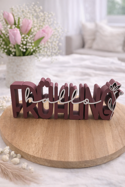 Dekorativer 3D Schriftzug ‚Hallo Frühling‘ in verschiedenen Farbvarianten