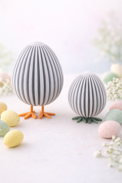 Modernes graues Osterei mit Füßen als minimalistische Osterdekoration