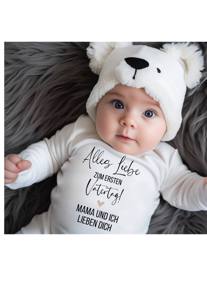 Baby wearing white Babybody with bear hat, lying on grey fur blanket.