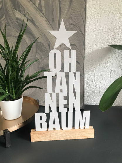 Weihnachtsdekoration mit "Oh Tannenbaum" Schriftzug aus Acryl und Holzklötzchen, festliche Deko für Zuhause.