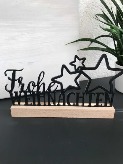 Festlicher "Frohe Weihnachten" Schriftzug aus Acryl und Holz, elegante Weihnachtsdekoration.