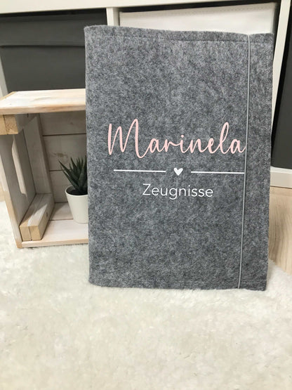 Grey felt Zeugnismappe for A4 documents with personalized text.