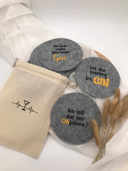 Filzuntersetzer mit Gin-Sprüchen, ideal für Mädelsabend oder Junggesellinenabschied, in hellgrau melliertem Design.