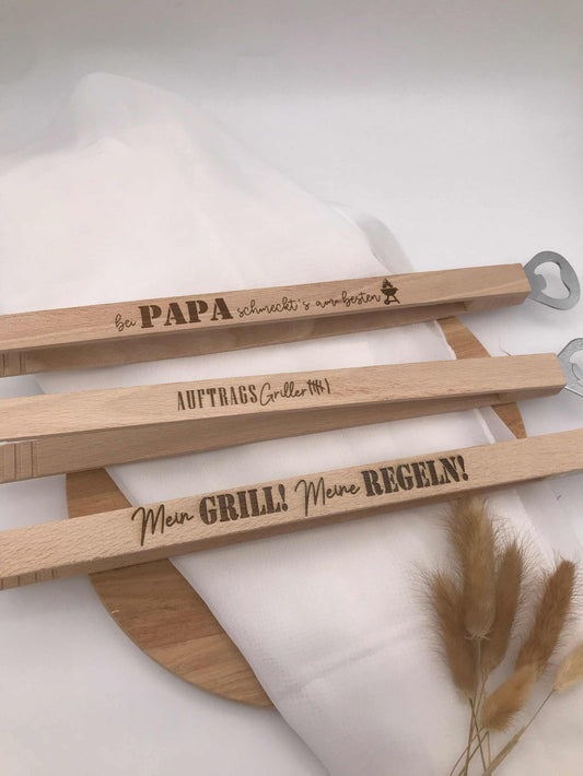 Wooden grill tongs with engraved BBQ sayings and built-in bottle opener, personalized BBQ accessory