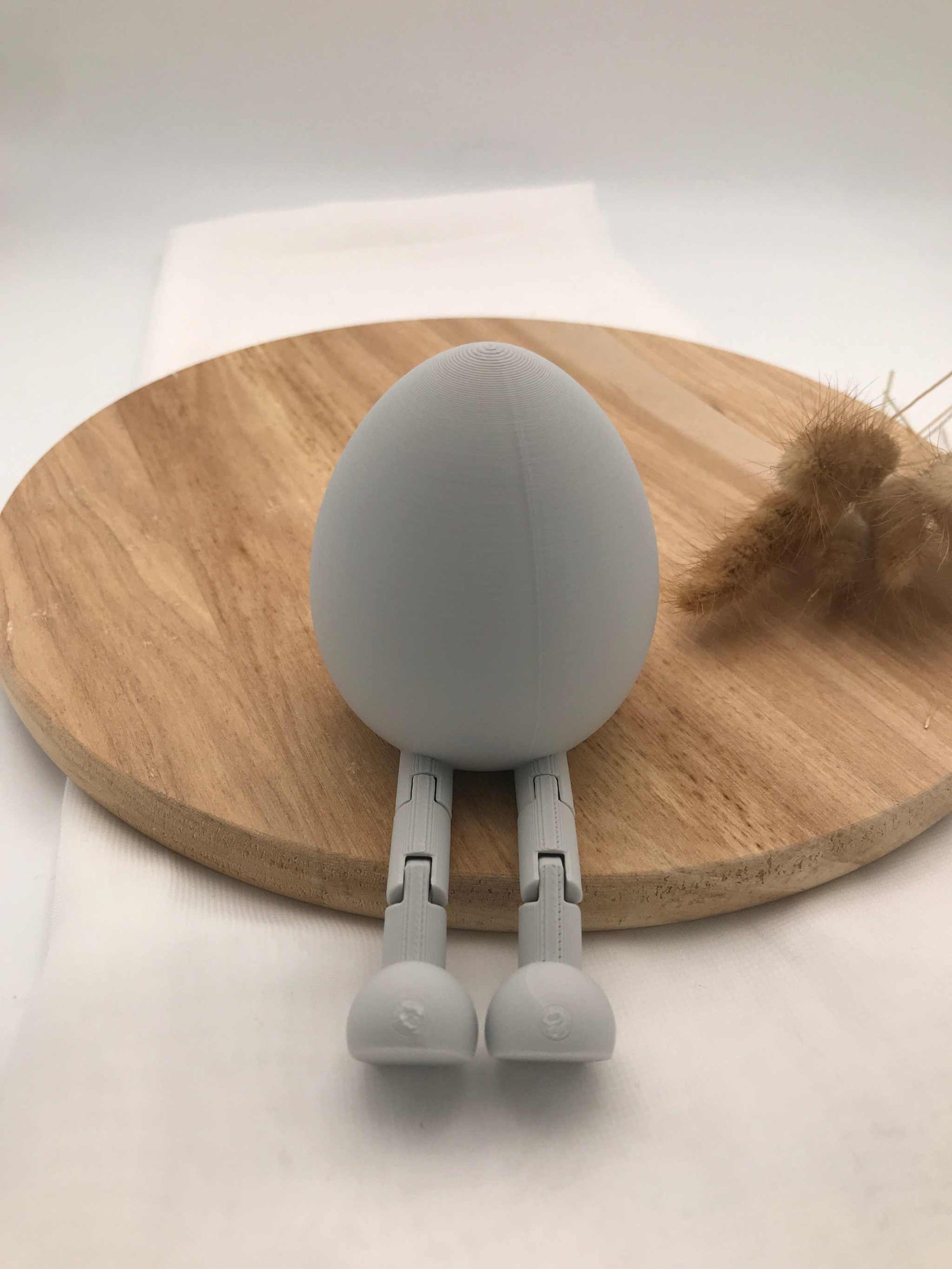 Moderne sitzende Hasen-Osterdeko aus PLA mit beweglichen Wackelbeinen, minimalistisches Design, Frühlingsstimmung